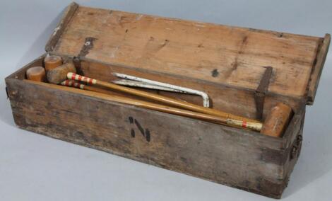 An early to mid 20thC croquet set