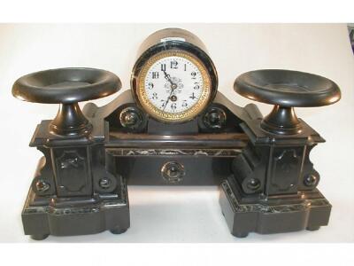 A 19thC black slate and marble clock garniture