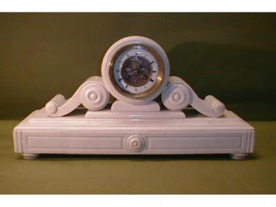 A 19thC French white marble mantel clock by Marti