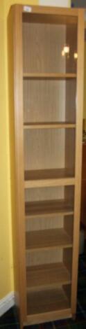 A modern lightwood display cabinet