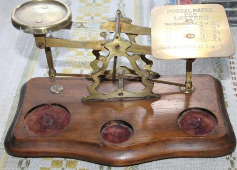 A set of early 20thC tabletop postal scales