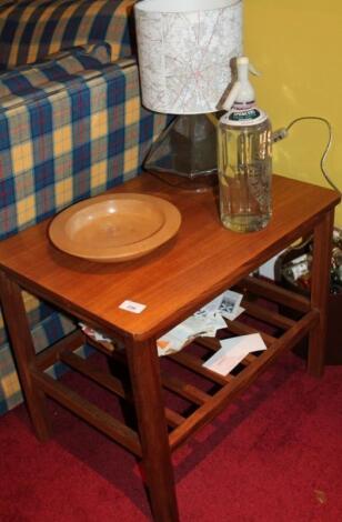 A lightwood side table with rack undertier