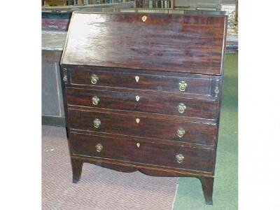 A George III cross banded mahogany bureau