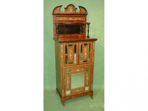 A fine Edwardian rosewood music cabinet with marquetry inlays and stringing