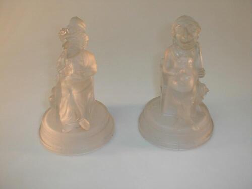 A pair of frosted pressed glass figure by John Derbyshire