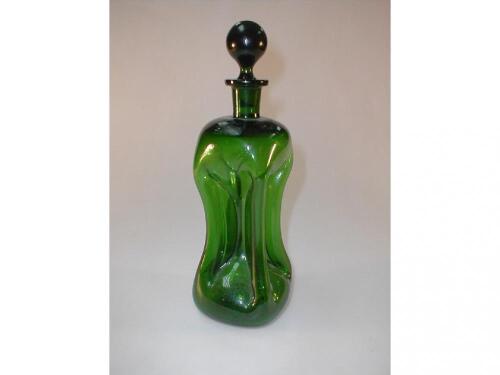 A 19thC green glass dimple decanter