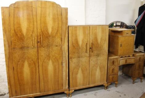 A 1930's Art Deco walnut veneered part bedroom suite