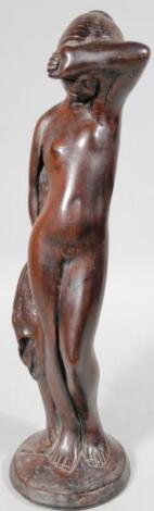 A 20thC statue of a nude lady