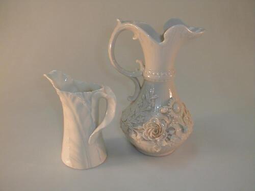 A Belleek floral encrusted ewer