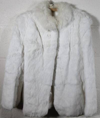 A White faux fur style jacket