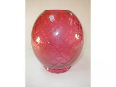 A large "quilted" cranberry glass shade