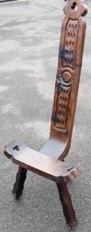 An elm stained rustic three pronged seat