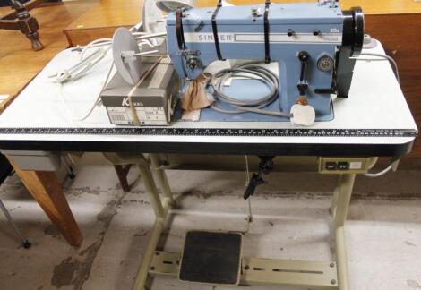 A Singer metal framed professional 20U sewing machine