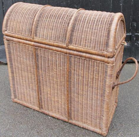 A modern wicker style domed topped casket