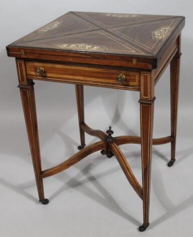 A late Victorian rosewood and marquetry envelope card table