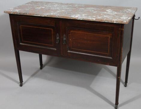 A late Victorian mahogany and boxwood strung marble top washstand