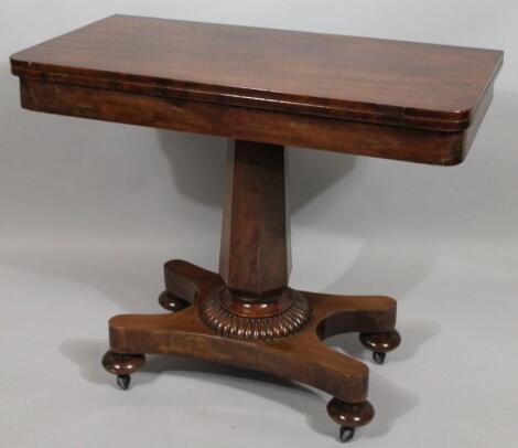 A mid 19thC mahogany foldover centre tea table