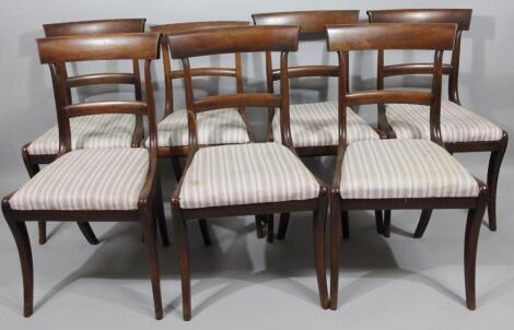 A harlequin set of seven Victorian mahogany bar back dining chairs