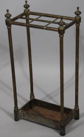 A Victorian brass stick stand.