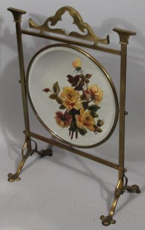 An early 20thC brass fire screen