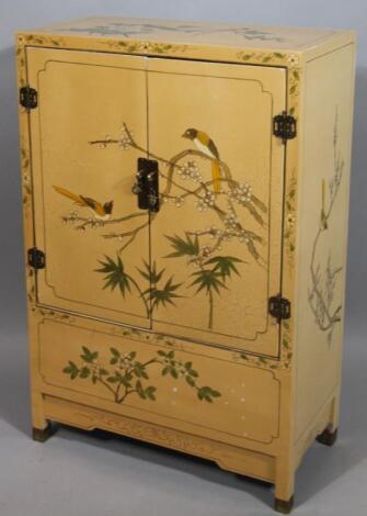 An oriental lacquer finish painted cabinet