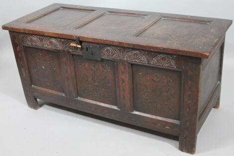 An 18thC oak three panelled coffer