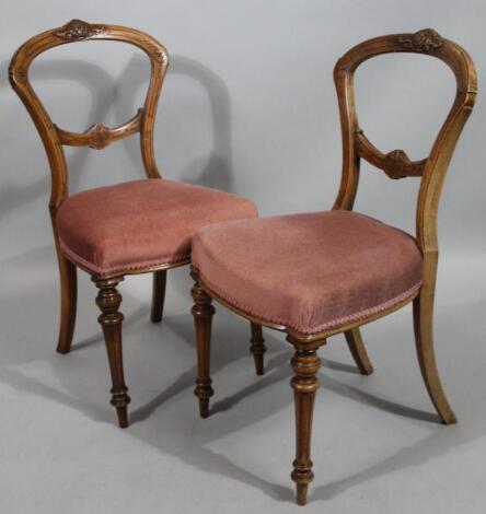 A pair of late 19thC/early 20thC walnut framed dining chairs