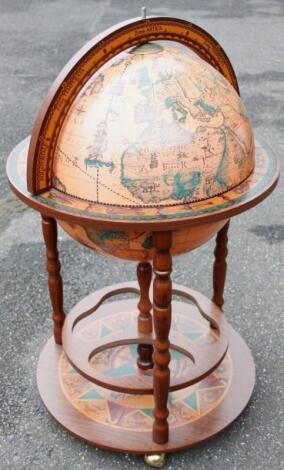 A modern terrestrial globe cocktail cabinet