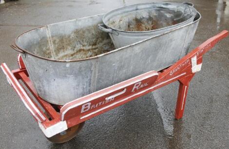 A painted slatted wheelbarrow