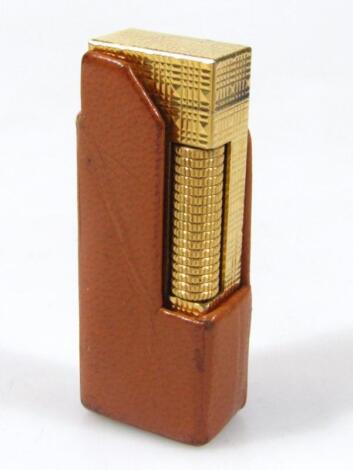 A mid 20thC gold plated Dunhill pocket lighter