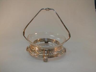 A WMF style Electroplate cake basket of pierced circular form with a cut