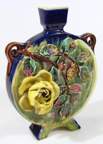 A late 19thC Continental majolica pottery moon flask