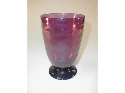 A Whitefriars amethyst glass vase with ripple pattern