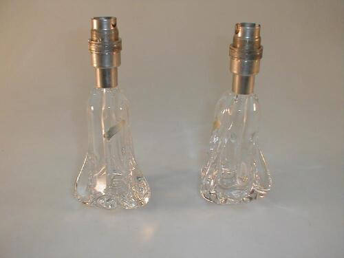 A pair of clear glass lamp bases marked Faitmain - paper labels