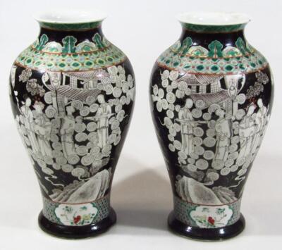 A pair of 19thC Chinese monochrome pottery vases