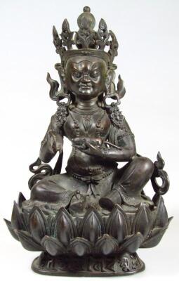 A Sino-Tibetan bronze figure of a deity