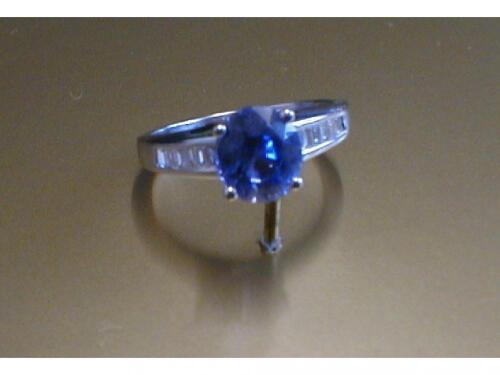 A sapphire and diamond set ring