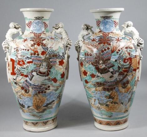 A pair of late 19thC Japanese earthenware vases