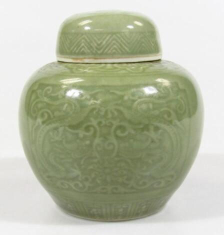 A Chinese celadon porcelain ginger jar and cover