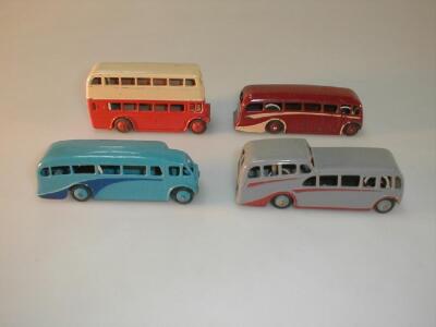 Four Dinky buses.