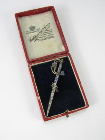 An unusual brooch in the form of a sword