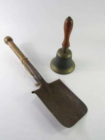 A WWII ARP hand bell and short handled riveted shovel.