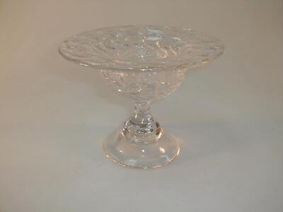 A heavy glass tazza with raised "S" decoration