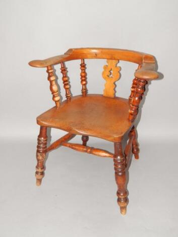 A Victorian oak smoker's bow chair