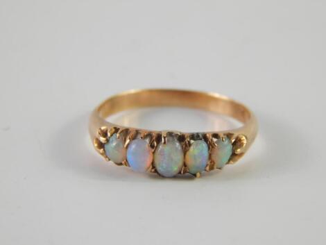 An opal set dress ring