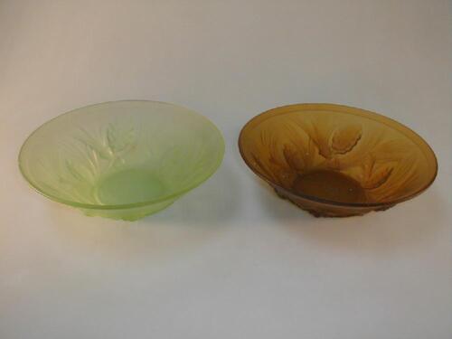 A Joblin frosted green glass bowl decorated with pine needles and cones;