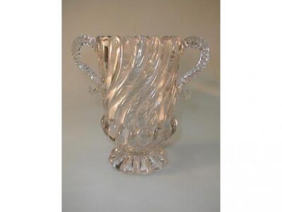 A heavy ribbed pressed glass two handled celery vase