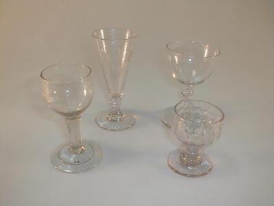 Two 18thC ale flutes, one engraved with hops, 5£" and 4£" high; a glass