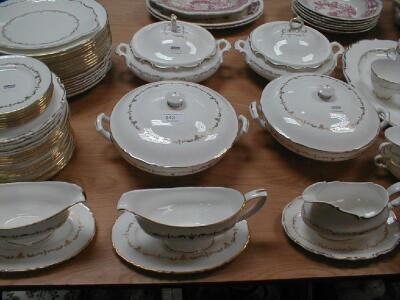 An extensive Royal Doulton and Royal Worcester harlequin dinner service