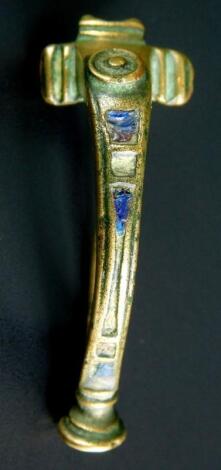 A Roman bronze and enamel headstud brooch